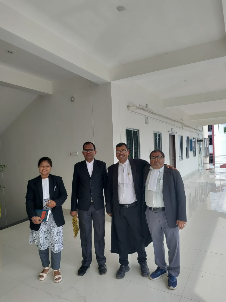 Advocates in court corridor